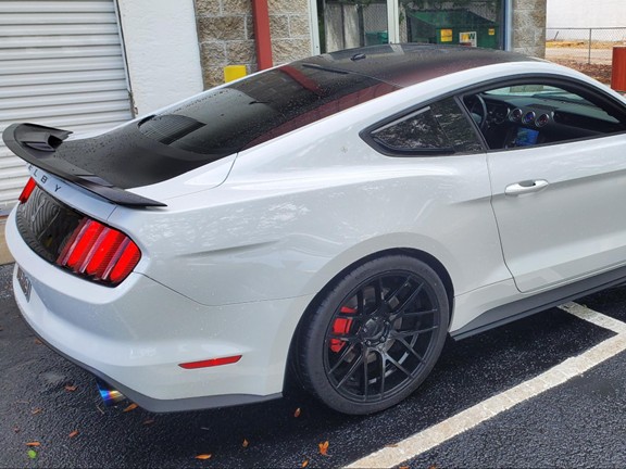 Angled cut round exhaust tip for active exhaust-equipped muscle cars