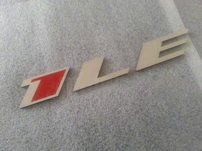 1LE Emblem; Stainless Steel with Red Insert (10-23 Camaro)