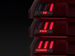 Sequential LED Tail Lights; Matte Black Housing; Clear Lens (99-04 Mustang, Excluding 99-01 Cobra)