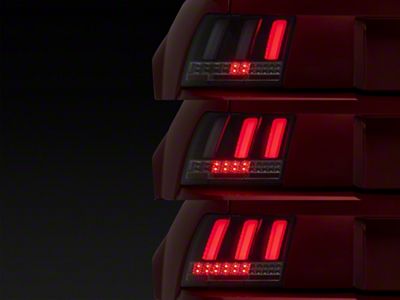 Sequential LED Tail Lights; Matte Black Housing; Clear Lens (99-04 Mustang, Excluding 99-01 Cobra)