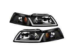 Crystal Headlights with LED Light Bar; Black Housing; Clear Lens (99-04 Mustang)