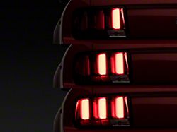 Red Light Bar LED Tail Lights; Black Housing; Clear Lens (05-09 Mustang)