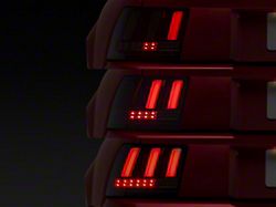 Sequential LED Tail Lights; Gloss Black Housing; Smoked Lens (99-04 Mustang, Excluding 99-01 Cobra)