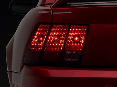 OPR Tail Light; Chrome Housing; Red/Clear Lens; Driver Side (99-04 Mustang, Excluding 99-01 Cobra)