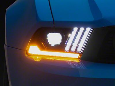 Raxiom LED Projector Headlights with DRL and Sequential Turn Signals; Black Housing; Clear Lens (10-14 Mustang with Halogen Bulbs)