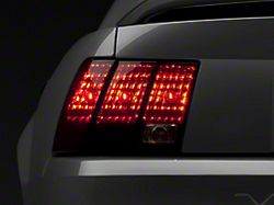 Raxiom Tail Lights; Black Housing; Smoked Lens (99-04 Mustang, Excluding 99-01 Cobra)