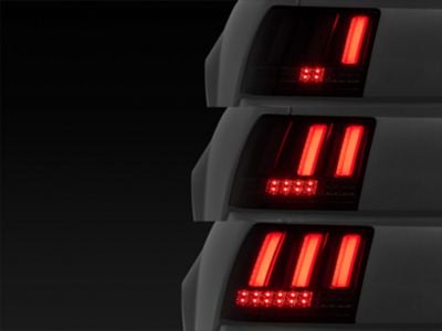 Sequential LED Tail Lights; Gloss Black Housing; Smoked Lens (99-04 Mustang, Excluding 99-01 Cobra)
