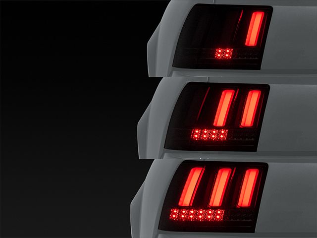 Sequential LED Tail Lights; Gloss Black Housing; Smoked Lens (99-04 Mustang, Excluding 99-01 Cobra)