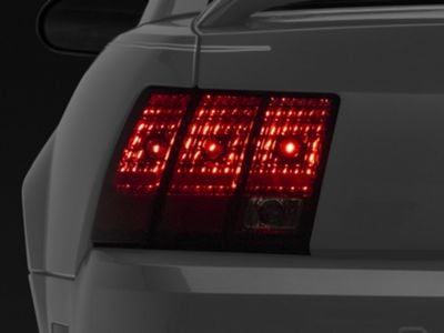 OPR Tail Light; Chrome Housing; Red/Clear Lens; Driver Side (99-04 Mustang, Excluding 99-01 Cobra)