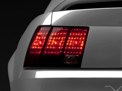 Raxiom Tail Lights; Black Housing; Smoked Lens (99-04 Mustang, Excluding 99-01 Cobra)