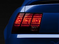 Raxiom Tail Lights; Black Housing; Smoked Lens (99-04 Mustang, Excluding 99-01 Cobra)